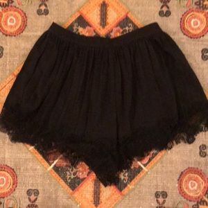Black laced hem shorts